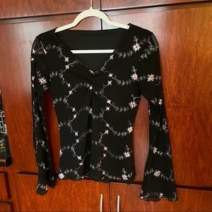 Vintage black flower top with sheer long sleeves.
